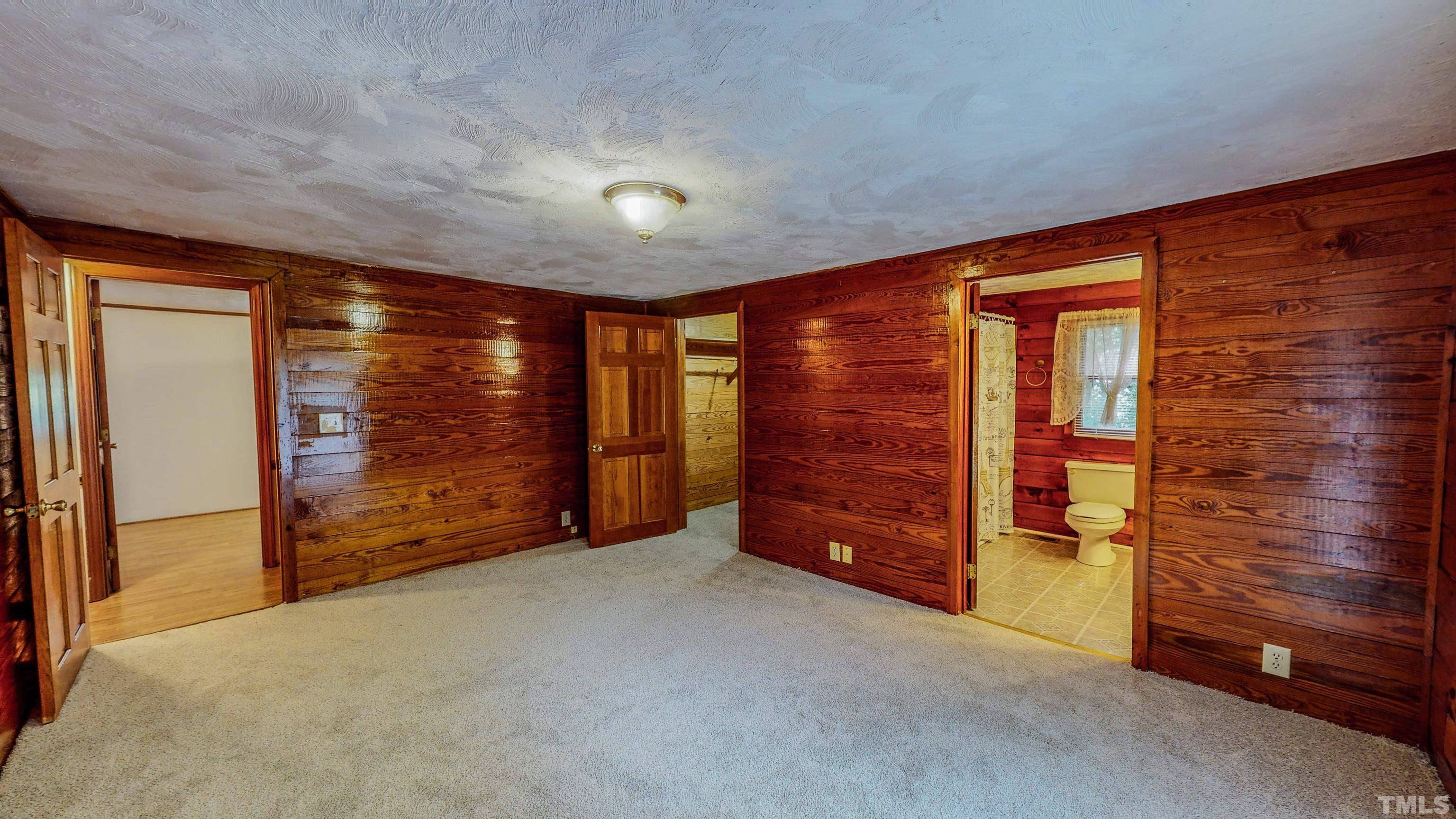 358 Gravitte Road Roxboro, NC 27573 - Photo 14 of 35 wooden floor in an empty room with a window