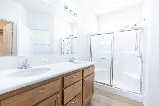 2014 South Brady Street Ridgecrest, CA 93555 - Photo 22 of 32 a bathroom with a sink and a mirror