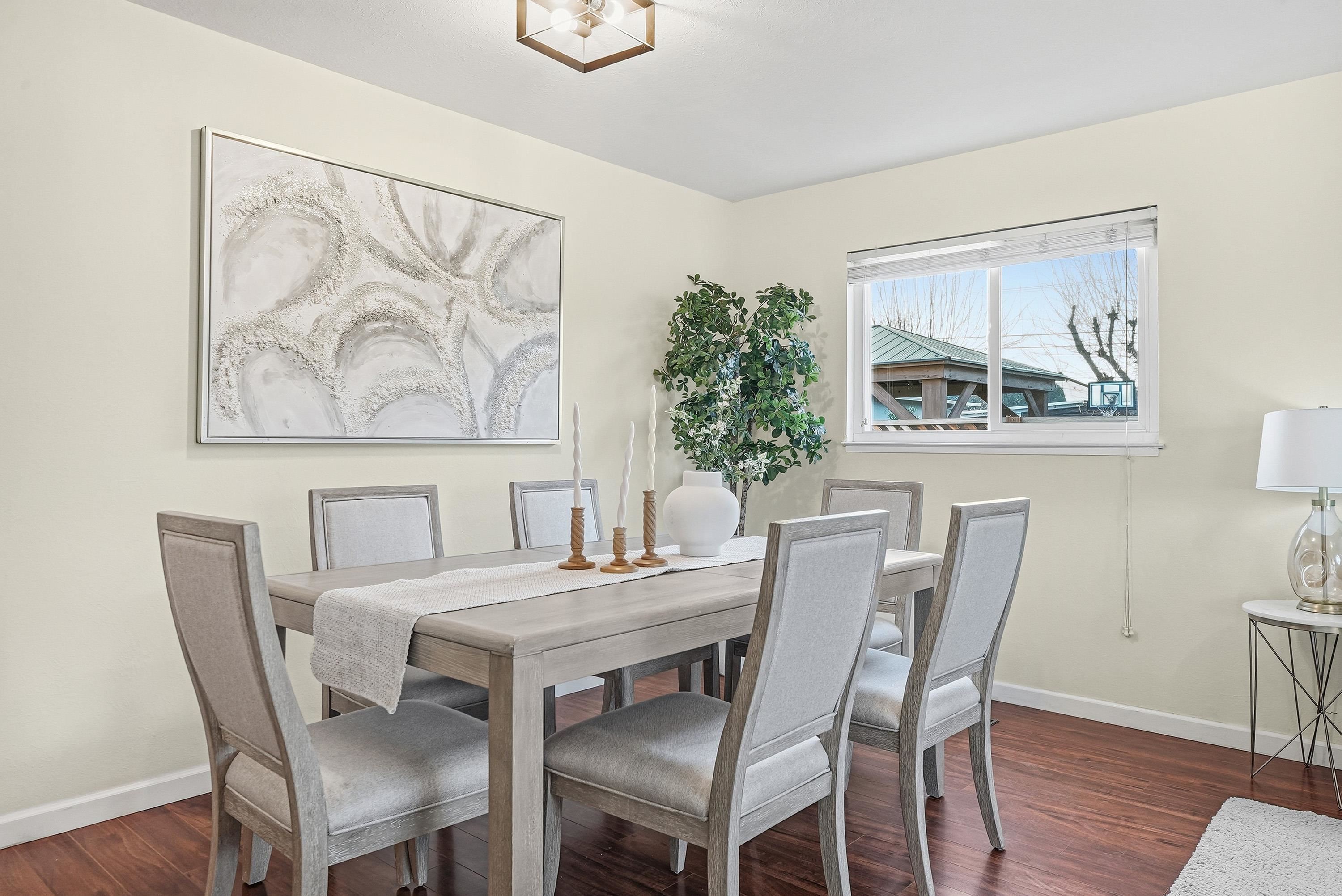 4214 Wells Street Pleasanton, CA 94566 - Photo 12 of 38 a view of a dining room with furniture and wooden floor