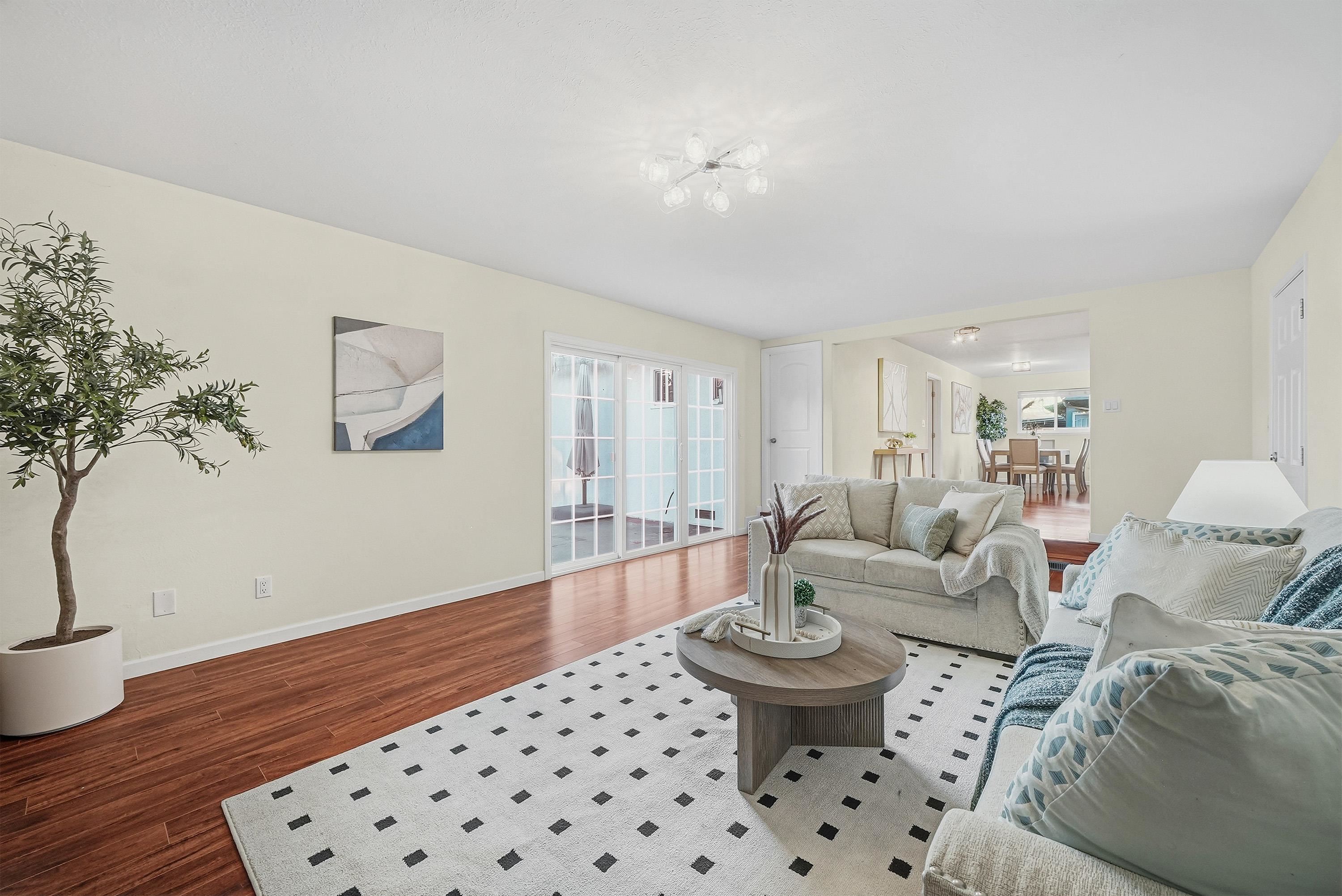4214 Wells Street Pleasanton, CA 94566 - Photo 20 of 38 a living room with furniture and a rug