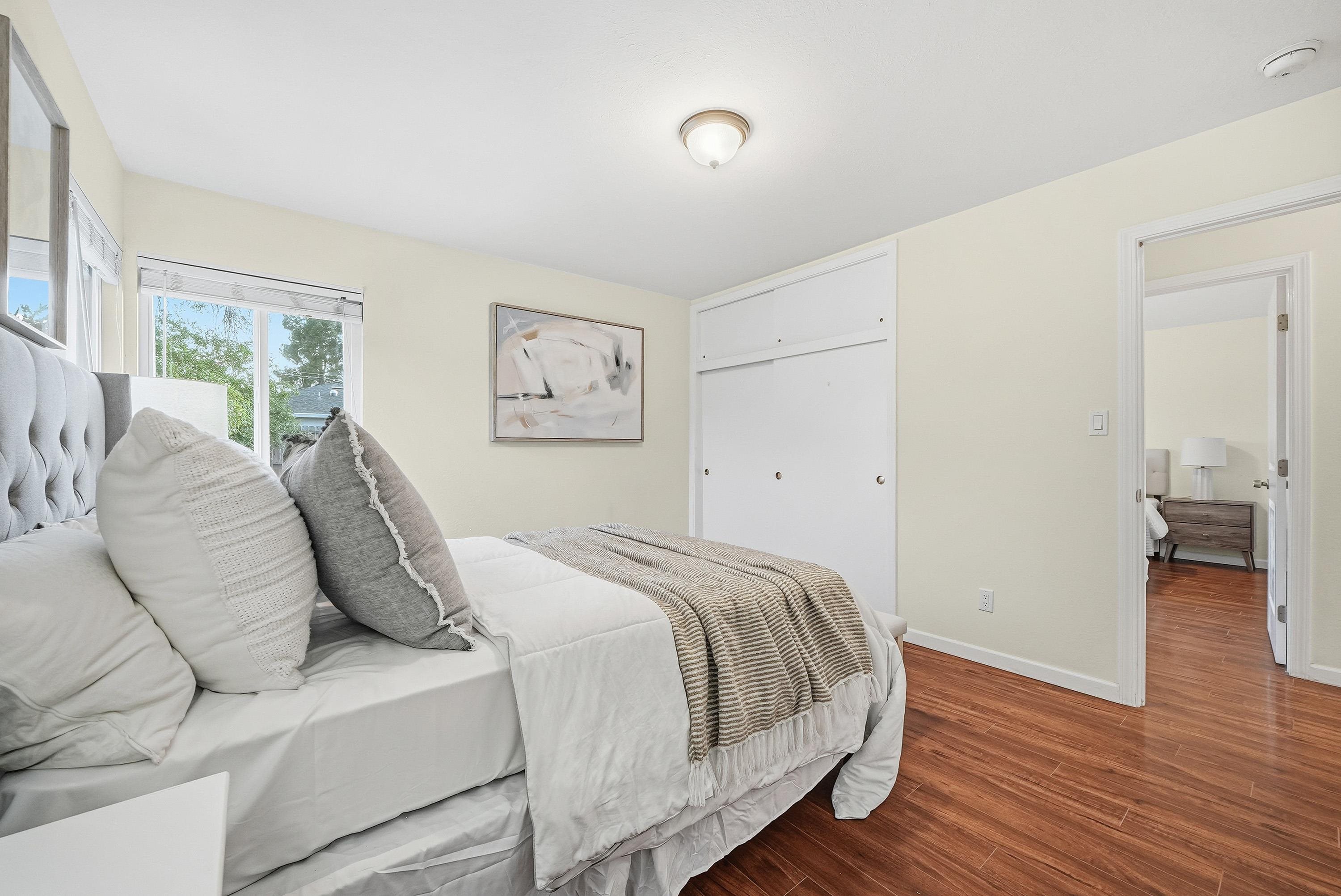 4214 Wells Street Pleasanton, CA 94566 - Photo 23 of 38 a bed room with a bed and a couch