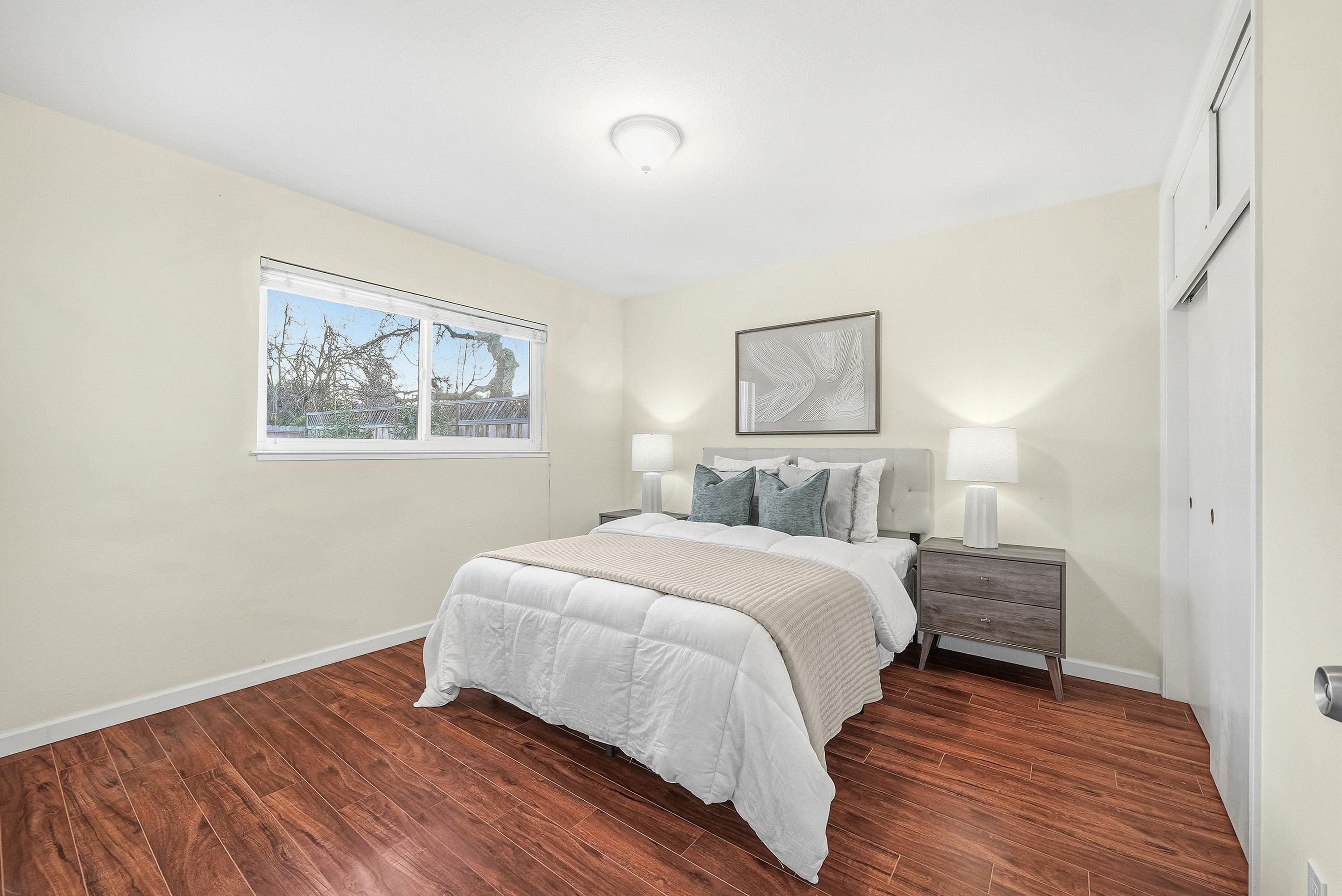 4214 Wells Street Pleasanton, CA 94566 - Photo 26 of 38 a bedroom with a bed and a window