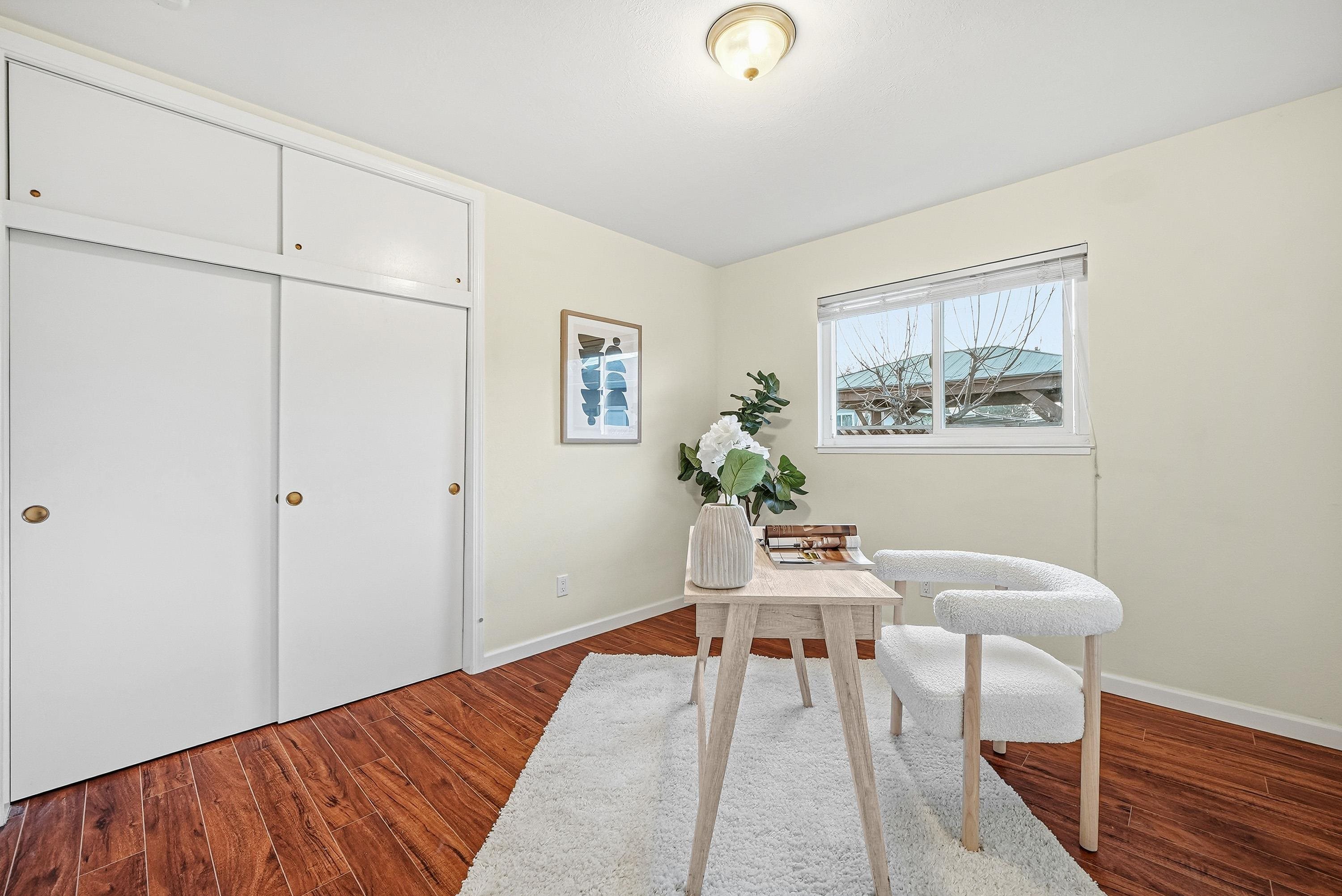 4214 Wells Street Pleasanton, CA 94566 - Photo 29 of 38 a workspace with furniture and wooden floor