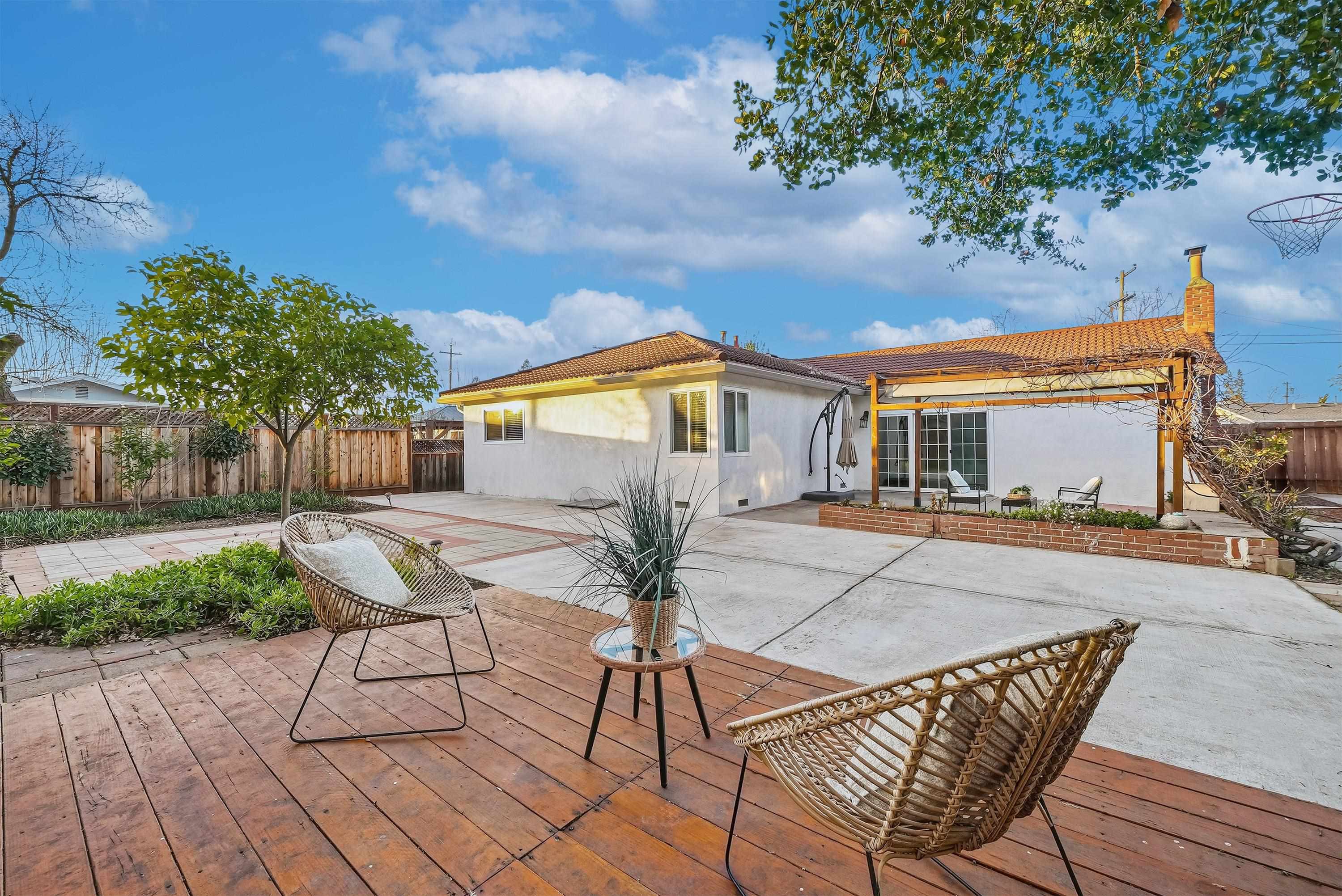 4214 Wells Street Pleasanton, CA 94566 - Photo 31 of 38 a view of a house with backyard and sitting area