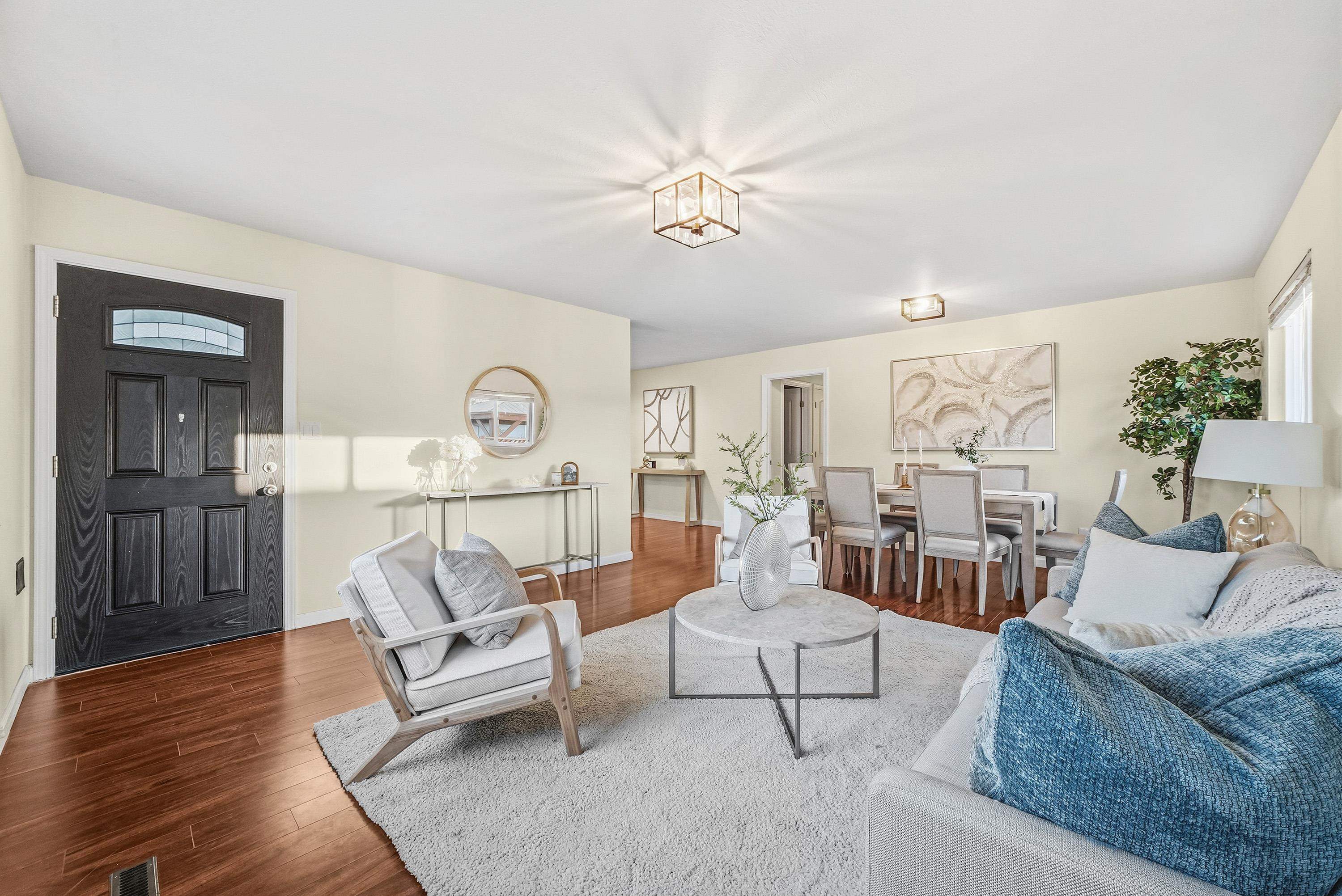 4214 Wells Street Pleasanton, CA 94566 - Photo 9 of 38 a living room with furniture and wooden floor