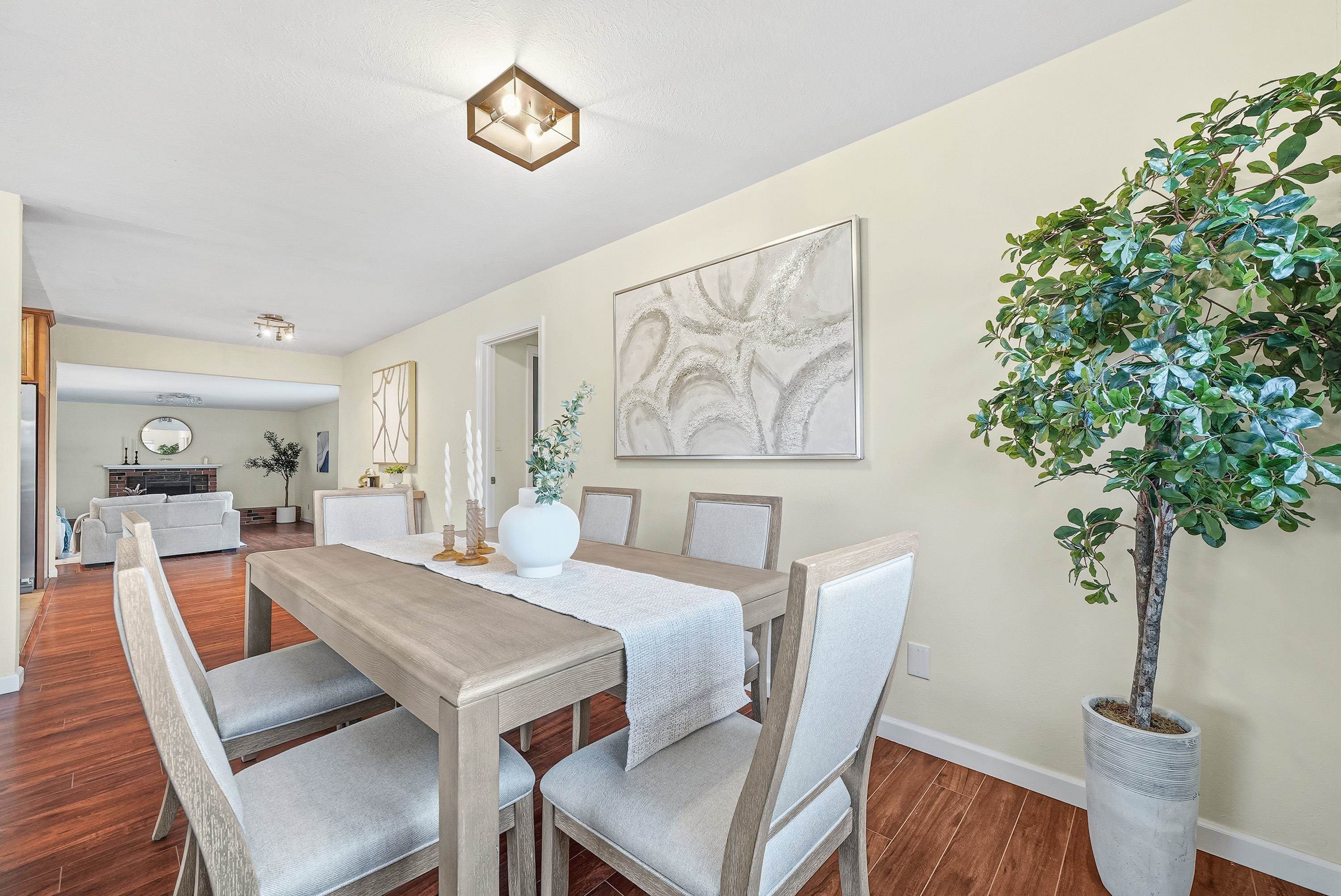 4214 Wells Street Pleasanton, CA 94566 - Photo 10 of 38 a view of a dining room with furniture window and wooden floor