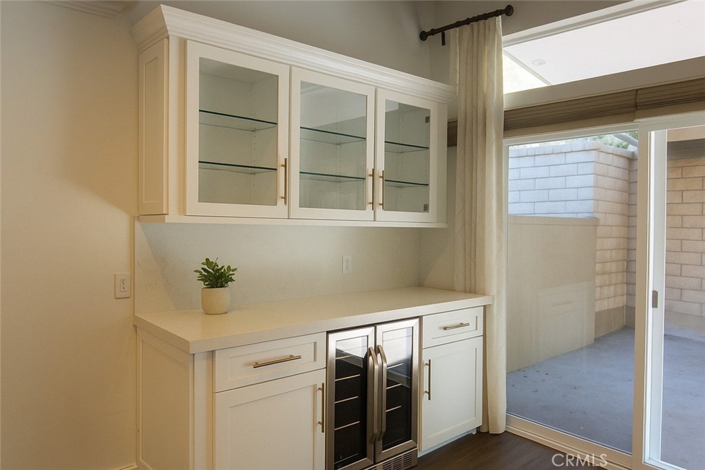 8000 East Snapdragon Lane Anaheim Hills, CA 92808 - Photo 11 of 27 a utility room with a sink dryer and washer