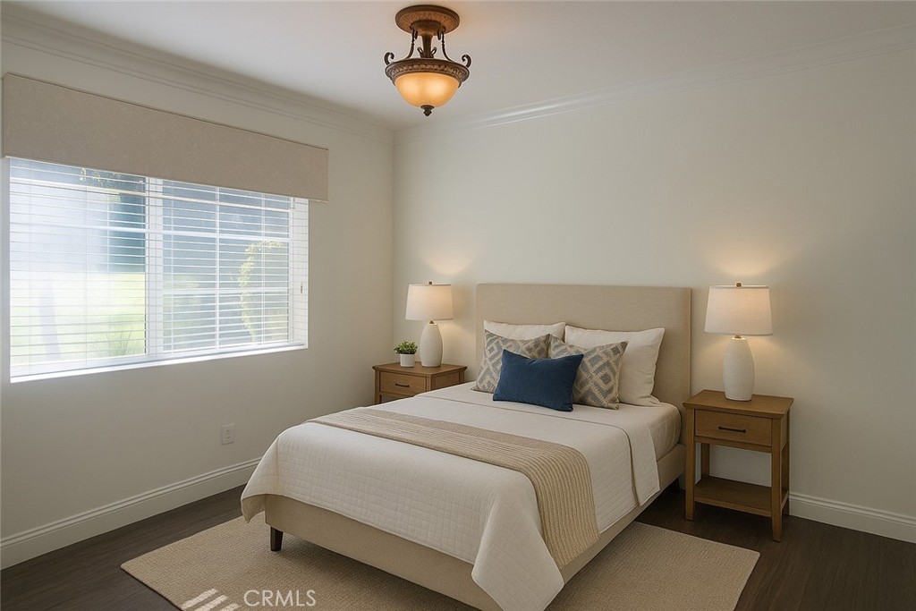 8000 East Snapdragon Lane Anaheim Hills, CA 92808 - Photo 14 of 27 a bedroom with a bed and a chandelier