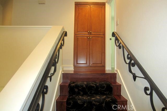 8000 East Snapdragon Lane Anaheim Hills, CA 92808 - Photo 19 of 27 a view of stairs and with wooden floor