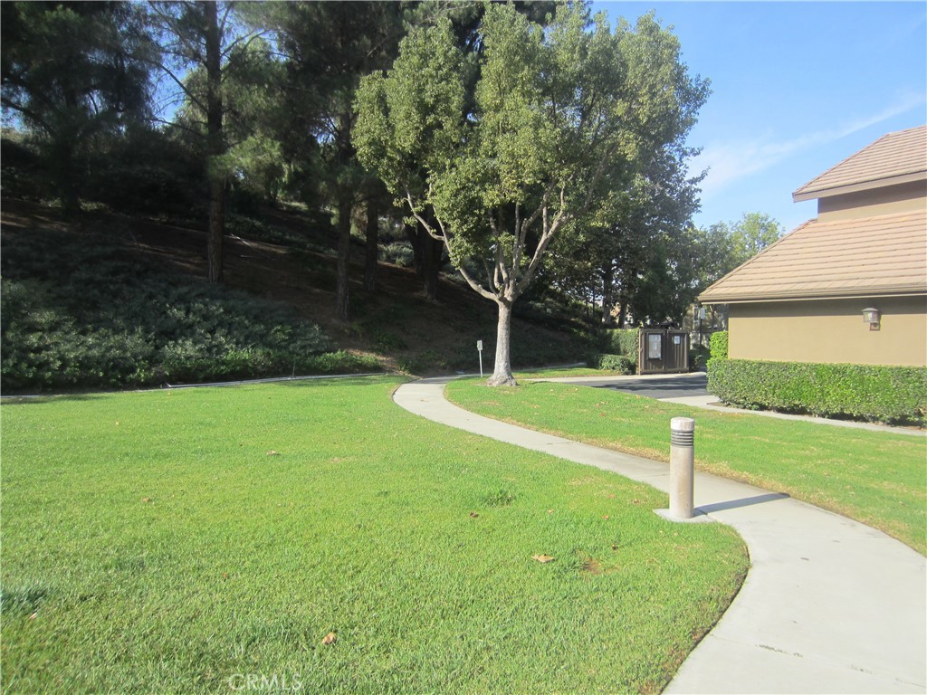 8000 East Snapdragon Lane Anaheim Hills, CA 92808 - Photo 2 of 27 a view of a house with a yard