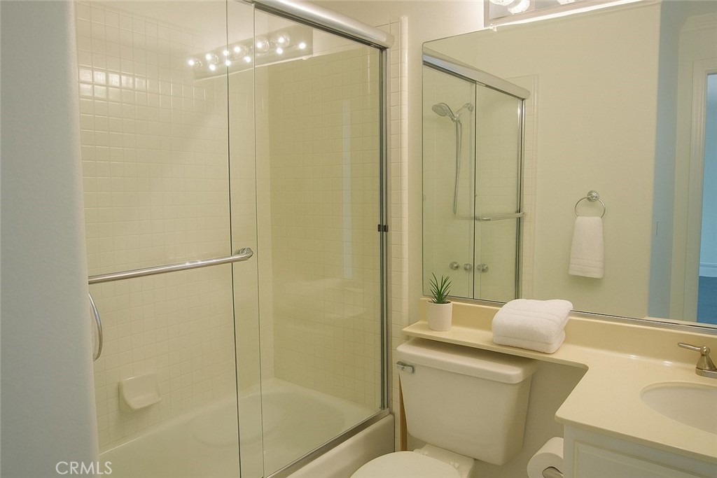 8000 East Snapdragon Lane Anaheim Hills, CA 92808 - Photo 26 of 27 a bathroom with a shower a toilet and a sink