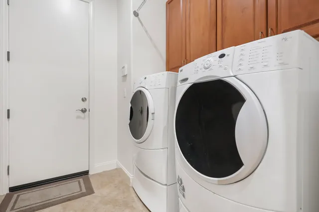 a view of swimming pool with a garden and plants