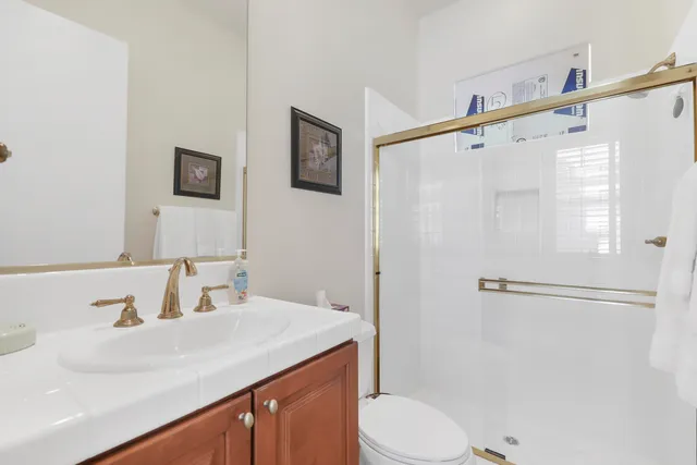 a living room with furniture wooden floor and a window