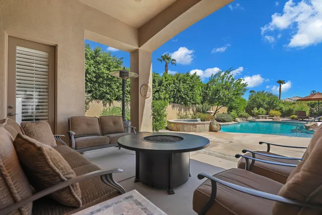 a stove top oven sitting inside of a kitchen