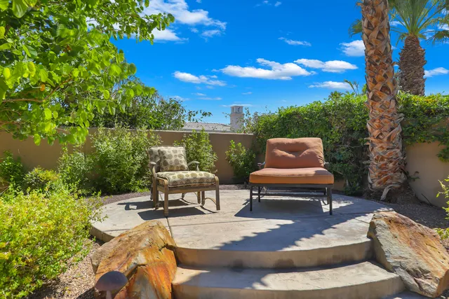 a view of a golf course with a garden