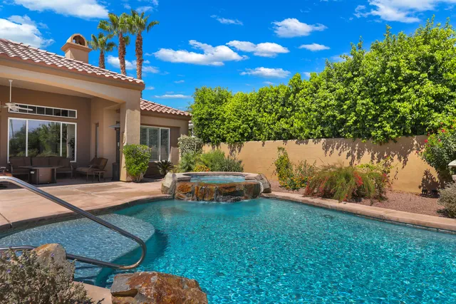 a view of a lake with a building in the background