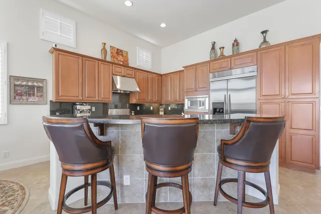 a close view of a sink and a mirror in a bathroom