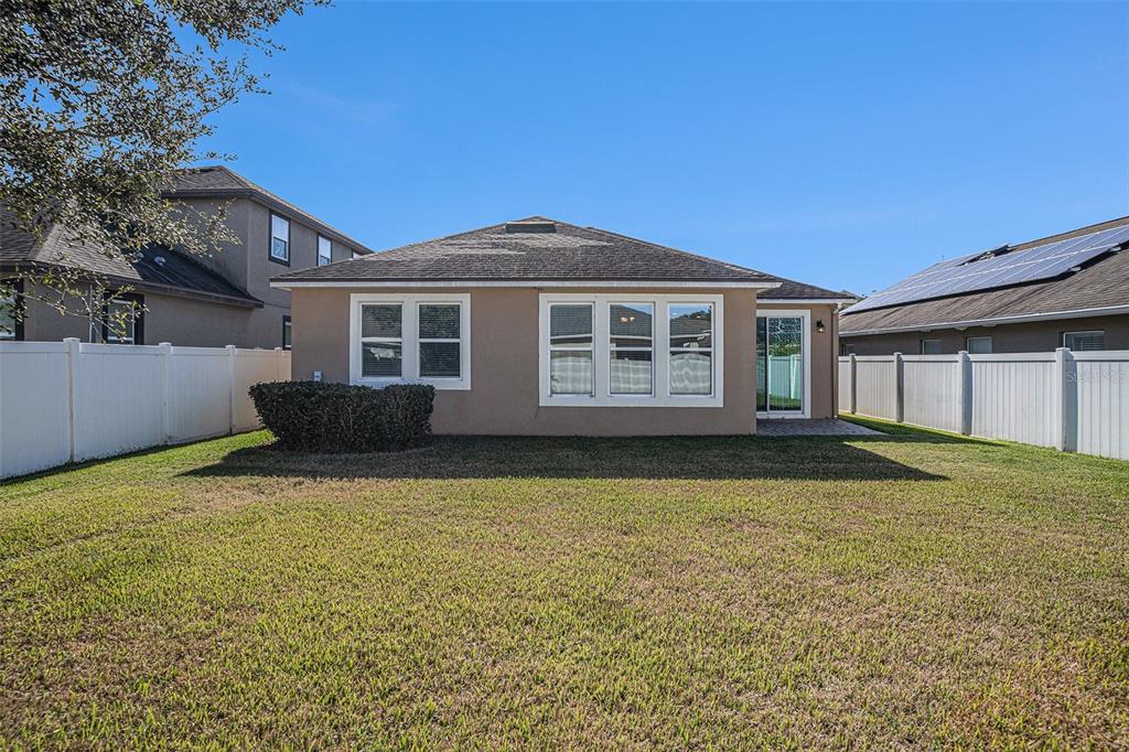 12314 Eagle Swoop Place Riverview, FL 33579 - Photo 21 of 23 a front view of a house with a yard