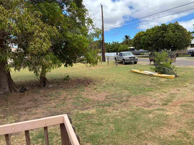 a view of a yard with a slide