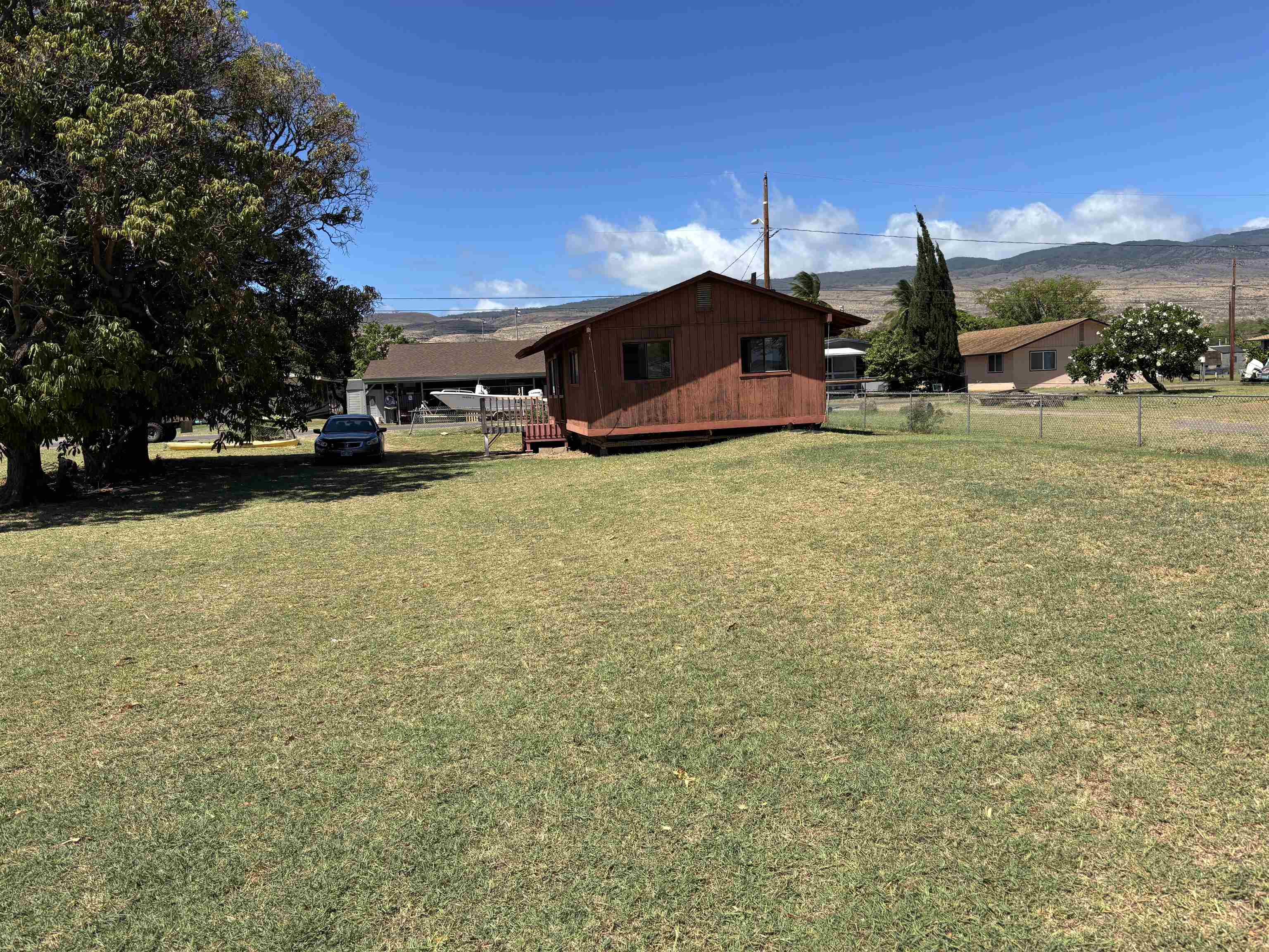 260 Seaside Street Kaunakakai, HI 96748 - Photo 9 of 17 a yellow swimming pool is sitting in the middle of a building