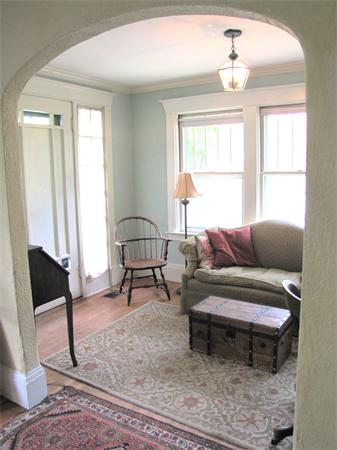 70-72 Beaconsfield Road Brookline, MA 02445 - Photo 11 of 22 a living room with furniture and a window