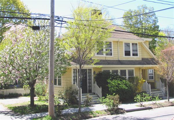 70-72 Beaconsfield Road Brookline, MA 02445 - Photo 2 of 22 a front view of a house with a garden