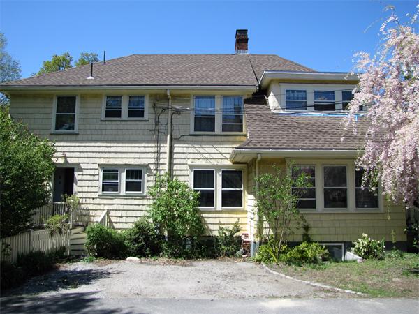 70-72 Beaconsfield Road Brookline, MA 02445 - Photo 21 of 22 a front view of a house with a yard