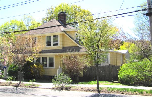 70-72 Beaconsfield Road Brookline, MA 02445 - Photo 22 of 22 a front view of a house with a yard