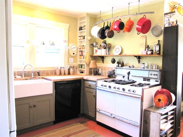 70-72 Beaconsfield Road Brookline, MA 02445 - Photo 7 of 22 a kitchen with a stove a sink and a microwave