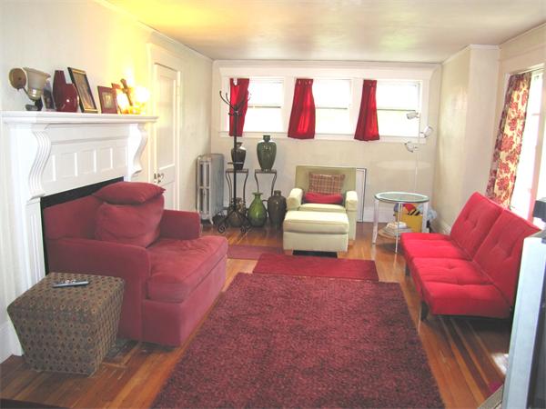 70-72 Beaconsfield Road Brookline, MA 02445 - Photo 8 of 22 a living room with furniture and a couch