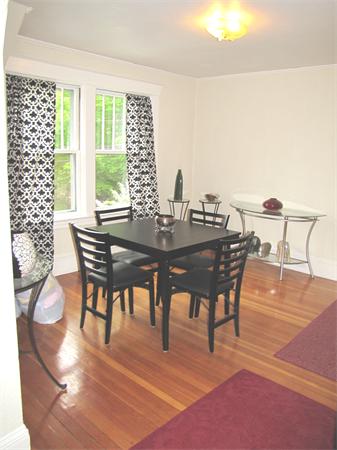 70-72 Beaconsfield Road Brookline, MA 02445 - Photo 9 of 22 a view of a dining room with furniture and wooden floor