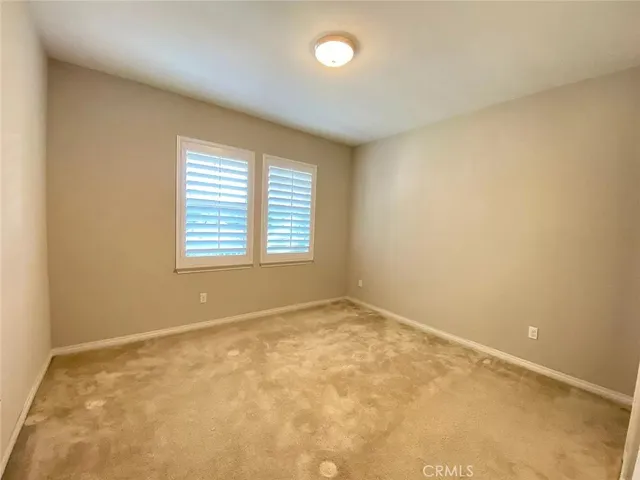 a large kitchen with kitchen island a sink counter space a sink and appliances