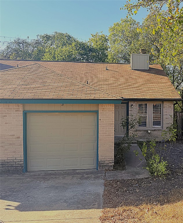 12800 Tomanet Trail, Unit B Austin, TX 78727 - Photo 1 of 12 a view of a house with a yard