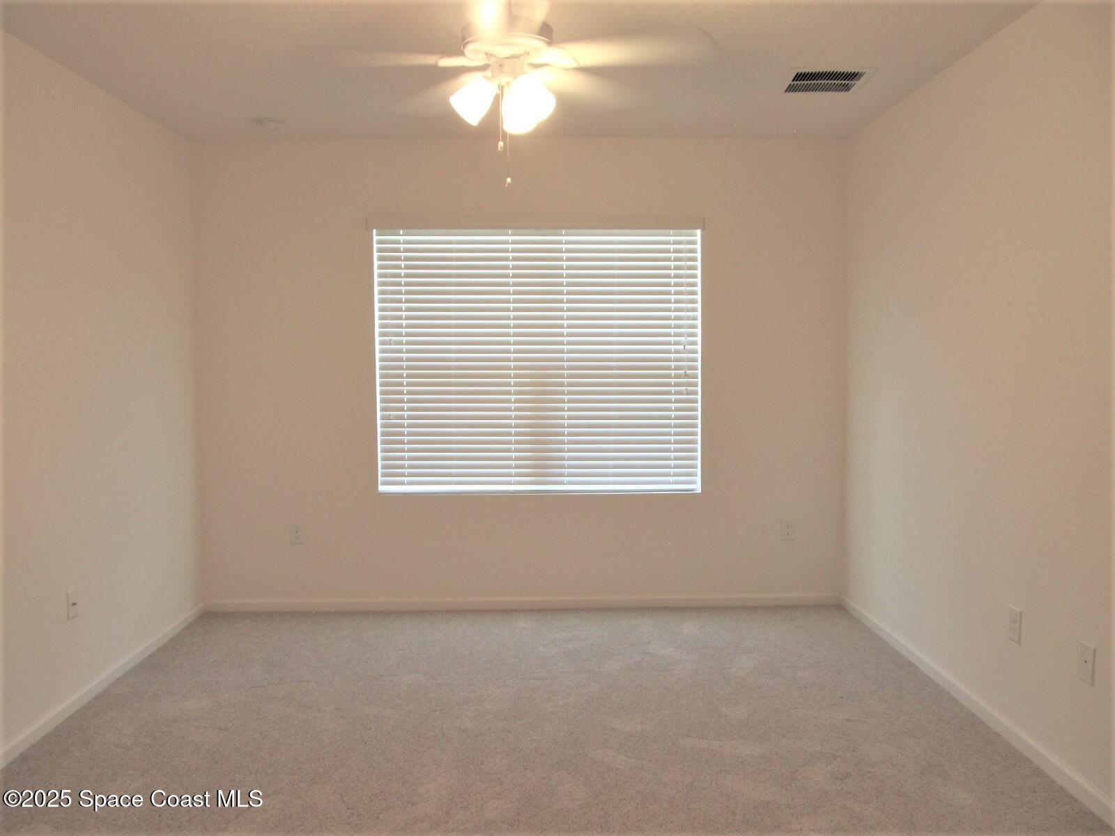 2002 Elkins Point Melbourne, FL 32935 - Photo 11 of 25 Main Bedroom