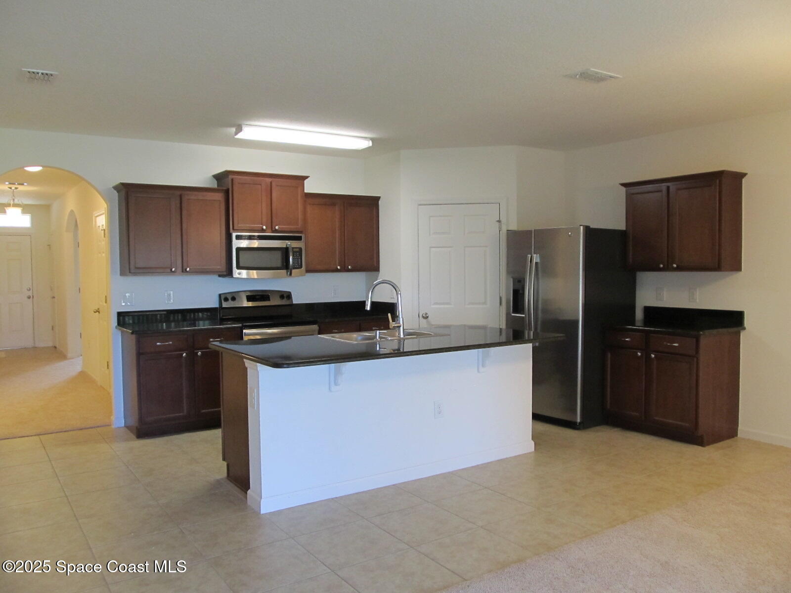 2002 Elkins Point Melbourne, FL 32935 - Photo 6 of 25 Kitchen Island