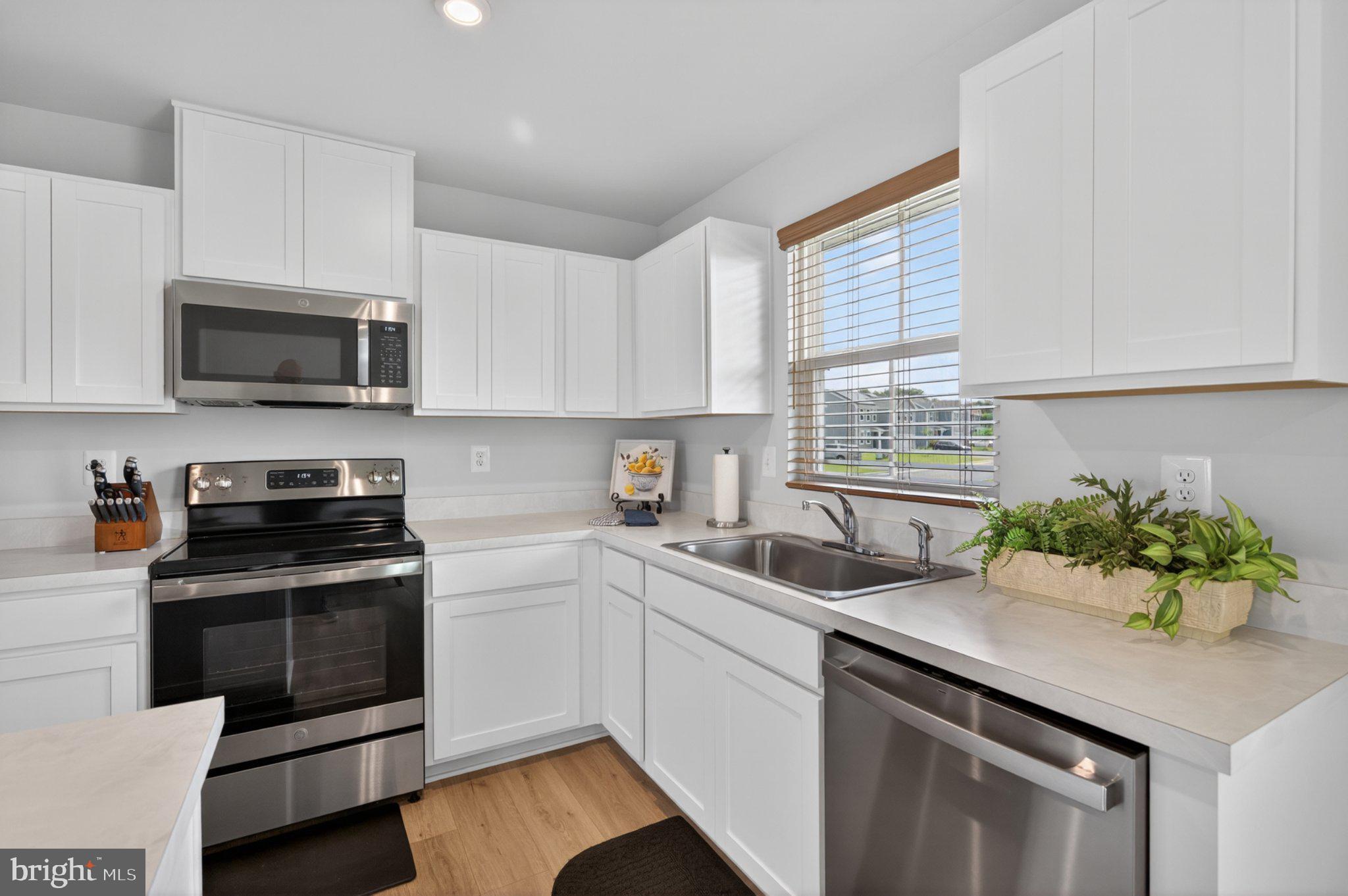84 Tadpole Landing Road Inwood, WV 25428 - Photo 3 of 30 Bright and modern kitchen oasis.