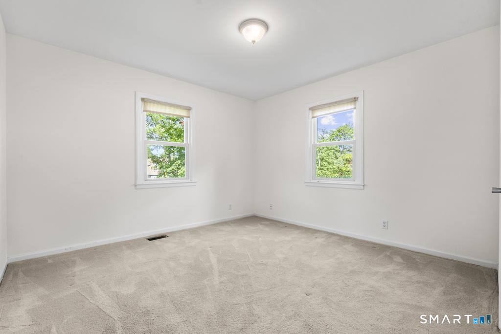 120 Saddleview Road Fairfield, CT 06825 - Photo 17 of 40 1st-Floor Bedroom across from Full Bath.