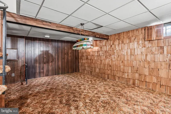 a bedroom with a bed and a table