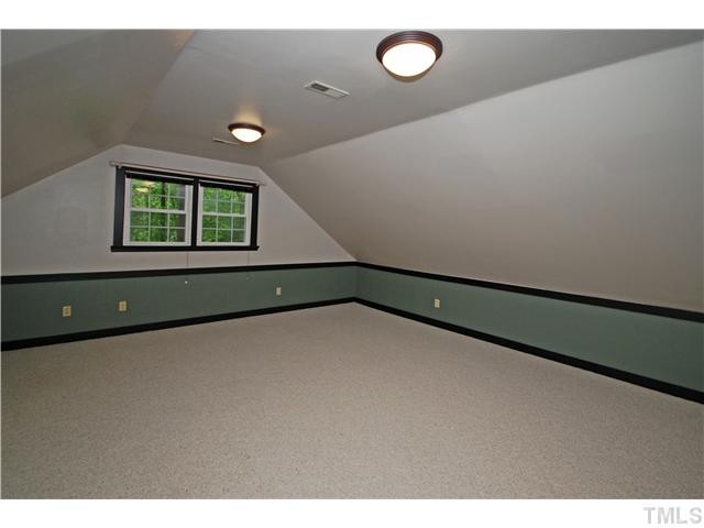 8304 Heel Stone Court Raleigh, NC 27613 - Photo 17 of 25 The Bonus room is located on the 3rd floor and also has a walk in attic. Bonus Room