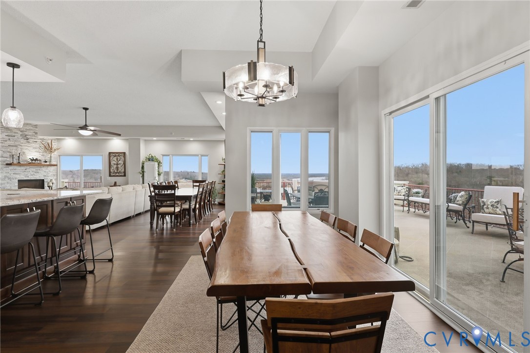 301 Beacon Ridge Drive, Unit 804 Hopewell, VA 23860 - Photo 12 of 64 a view of a dining room with furniture window and wooden floor