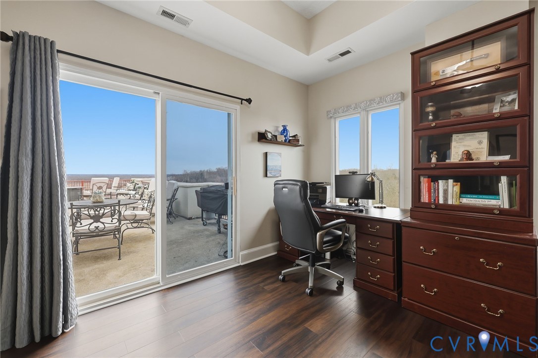 301 Beacon Ridge Drive, Unit 804 Hopewell, VA 23860 - Photo 33 of 64 a view of a workspace with furniture and a window