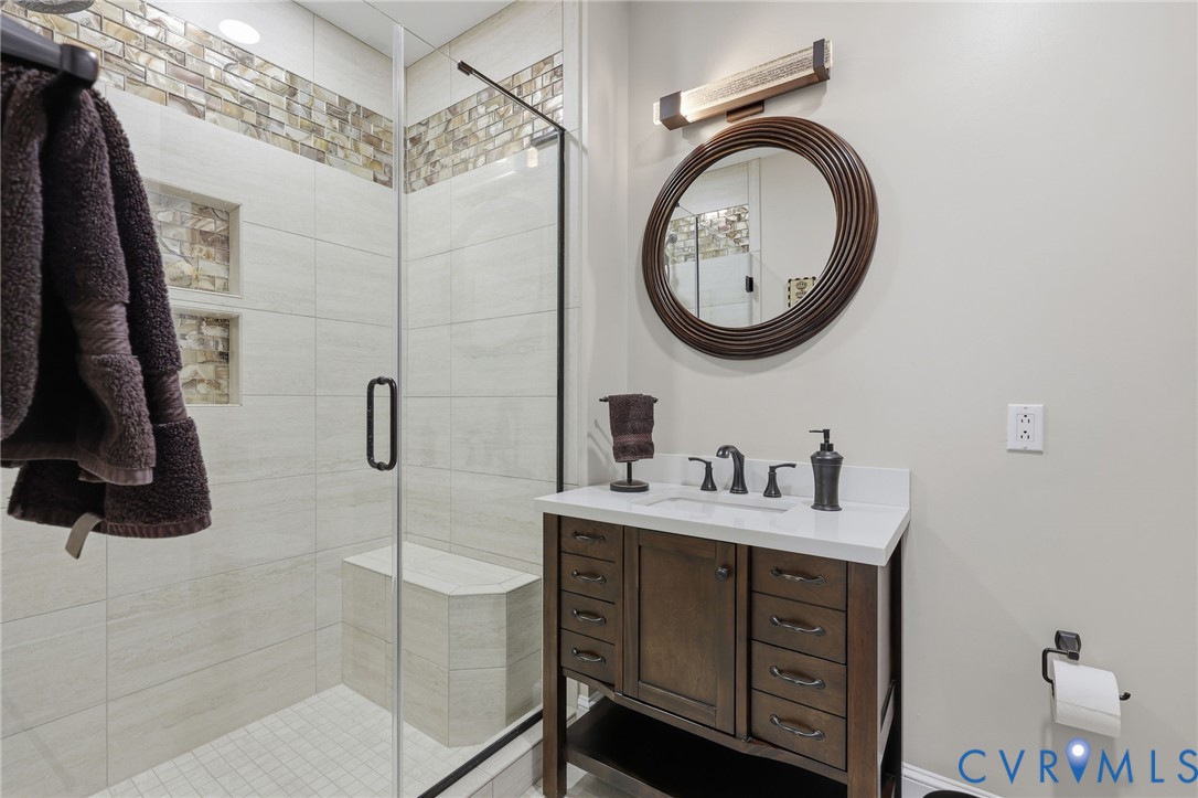 301 Beacon Ridge Drive, Unit 804 Hopewell, VA 23860 - Photo 35 of 64 a bathroom with a sink and a mirror