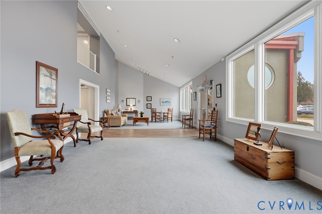 301 Beacon Ridge Drive, Unit 804 Hopewell, VA 23860 - Photo 49 of 64 a living room with furniture and a large window