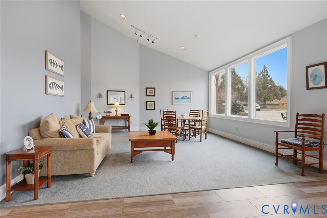 301 Beacon Ridge Drive, Unit 804 Hopewell, VA 23860 - Photo 50 of 64 a living room with furniture and a large window