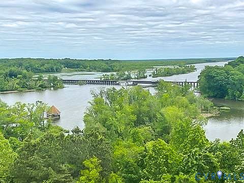 301 Beacon Ridge Drive, Unit 804 Hopewell, VA 23860 - Photo 56 of 64 a view of a lake with a big yard