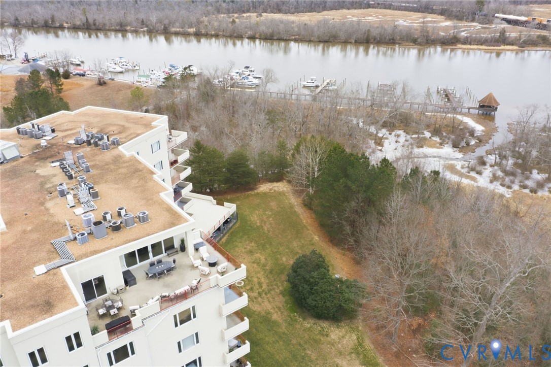 301 Beacon Ridge Drive, Unit 804 Hopewell, VA 23860 - Photo 60 of 64 a view of a lake in middle of the town