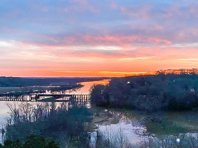 301 Beacon Ridge Drive, Unit 804 Hopewell, VA 23860 - Photo 6 of 64 a view of a lake with a city