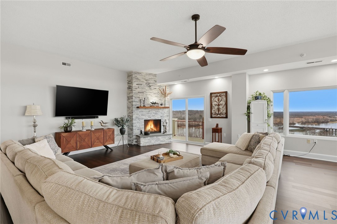 301 Beacon Ridge Drive, Unit 804 Hopewell, VA 23860 - Photo 8 of 64 a living room with furniture and a flat screen tv