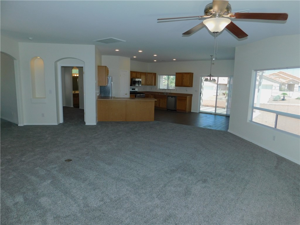 2449 Wilder Road Bullhead City, AZ 86442 - Photo 20 of 45 a view of a livingroom with furniture window and cabinet