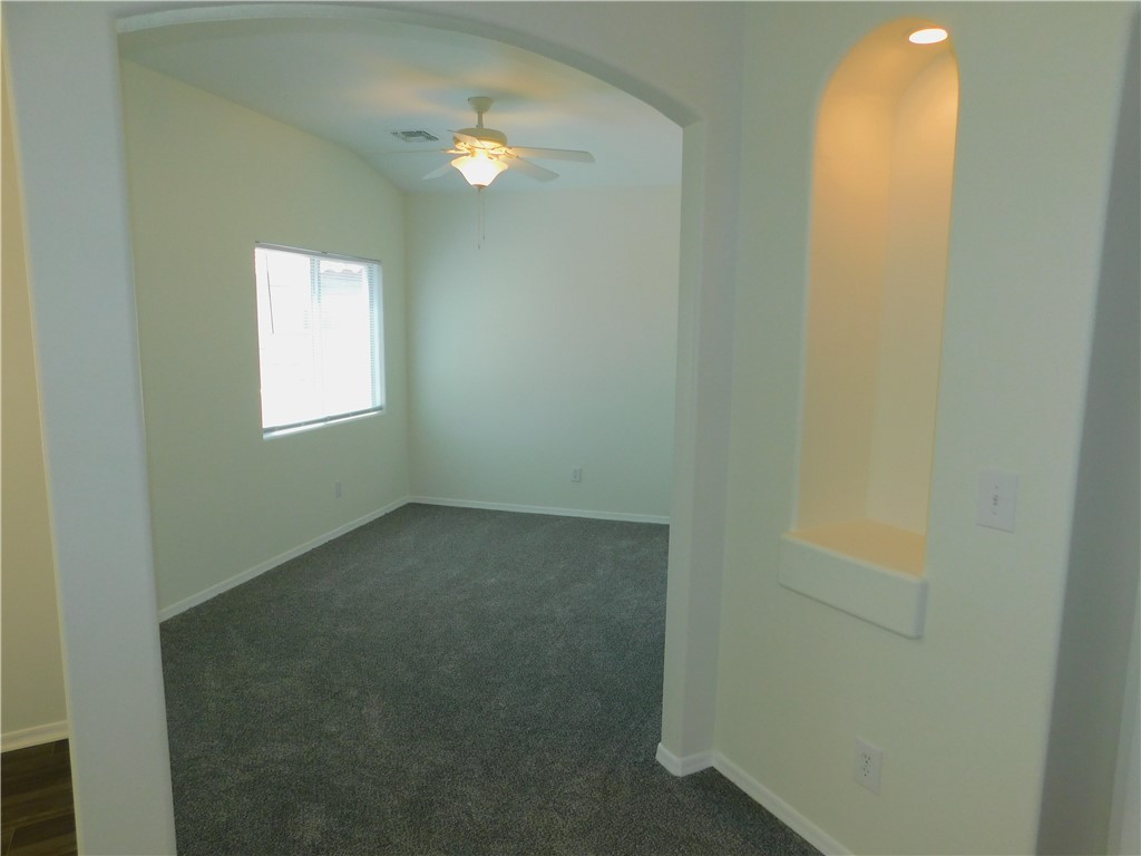 2449 Wilder Road Bullhead City, AZ 86442 - Photo 28 of 45 a view of an empty room and window